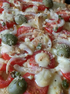 A picture of Sig's Potato Cake Pizza.