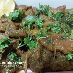A picture of Kareley ghosht (bitter gourd meat).