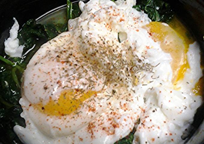 Poached eggs on a nest of spinach