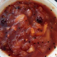 A picture of Raw mango ki kalonji wali chutney.