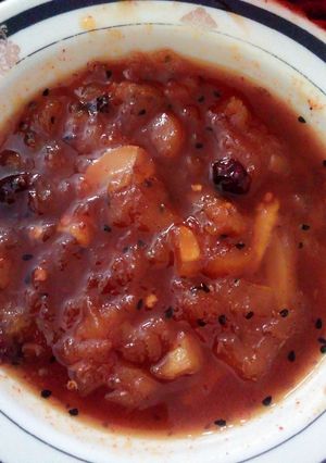 A picture of Raw mango ki kalonji wali chutney.