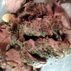 A picture of leg of lamb roasted.