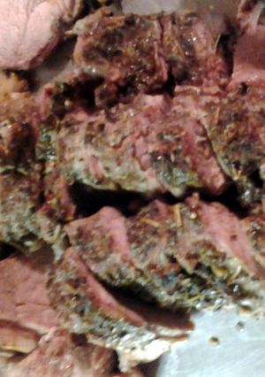 A picture of leg of lamb roasted.