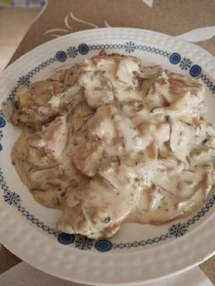 Una foto de Solomillo de cerdo con trufa y salsa de setas
