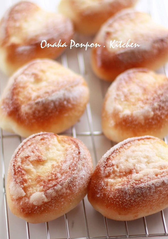 A picture of Milk Bread Topped with Sugar.