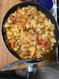 Chicken breast on Rigate cheese pasta