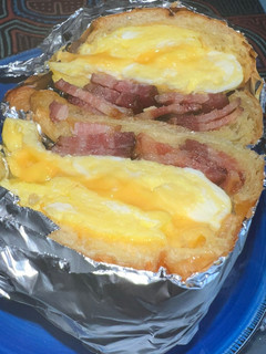 A picture of Bacon Egg Cheese on Freshly Baked Croissant.