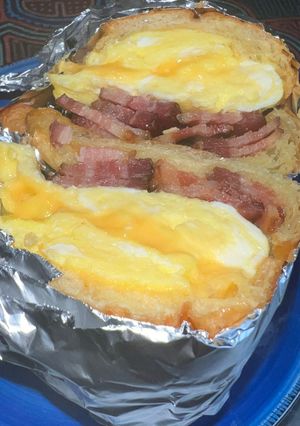 A picture of Bacon Egg Cheese on Freshly Baked Croissant.