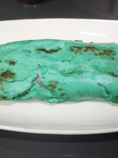 Una foto de Enrollado verde de coliflor y jamón dulce