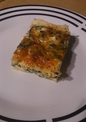 A picture of Spinach and feta quiche.