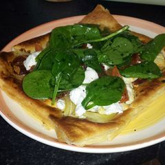 A picture of Onion, Cheese and Parma Ham Tart.