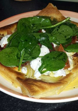 A picture of Onion, Cheese and Parma Ham Tart.