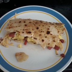A picture of Taylor ham egg and cheese bureto.