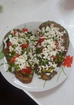 Una foto de Tlacoyos de nopal con frijoles