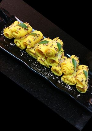 A picture of Coconut stuffed Mango Khandvi.