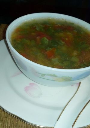 A picture of Beans Tomato Egg drop soup.