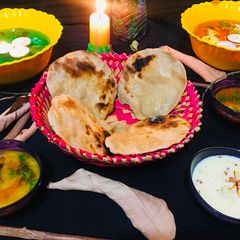 A picture of Oven  Butter Chapati And lacchedar Kheer.