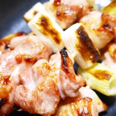 A picture of Salt-Seasoned Yakitori on a Grill.