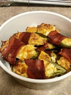 A picture of Stuffed Jalapeños wrapped in Turkey bacon.