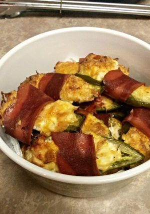 A picture of Stuffed Jalapeños wrapped in Turkey bacon.