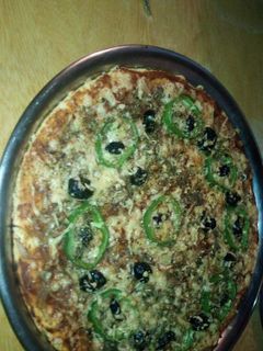 صورة لوصفة بيتزا لذيذة واقتصادية