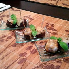 A picture of Mushrooms stuffed with a Sun-dried Tomato & Olive Tapenade.