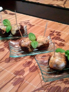 A picture of Mushrooms stuffed with a Sun-dried Tomato & Olive Tapenade.