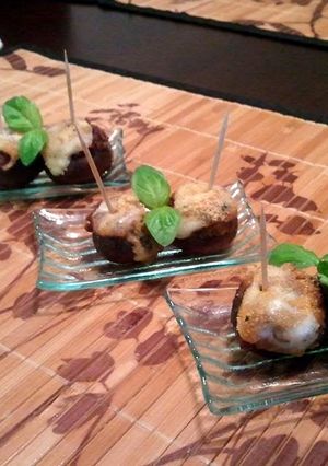 A picture of Mushrooms stuffed with a Sun-dried Tomato & Olive Tapenade.