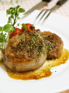 A picture of Pork Roll Steaks with Thinly Sliced Pork.