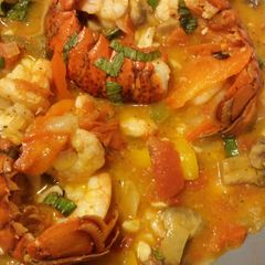 A picture of Shrimp & Lobster with tomatoes.