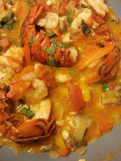 A picture of Shrimp & Lobster with tomatoes.