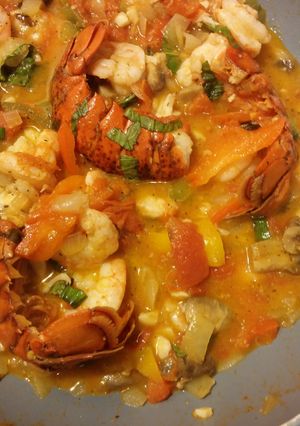 A picture of Shrimp & Lobster with tomatoes.
