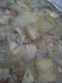 Una foto de Arroz con alcachofas y mejillones