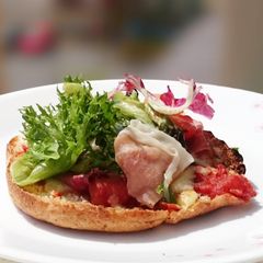 Proscuitto Pizza On Pita Bread Top Salad A picture of Proscuitto Pizza On Pita Bread Top Salad.