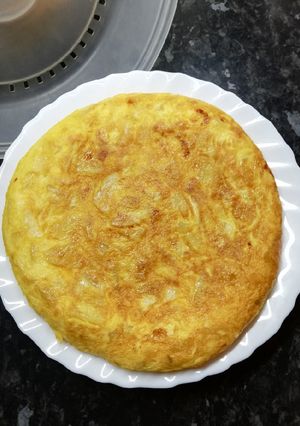 Una foto de Tortilla de patata y cebolleta