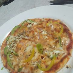 Pizza with shawarma bread and without cheese A picture of Pizza with shawarma bread and without cheese.