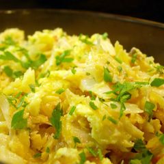 A picture of cod fish with scramble eggs and fries (portuguese bacalhau a bras ).