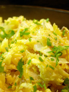 A picture of cod fish with scramble eggs and fries (portuguese bacalhau a bras ).