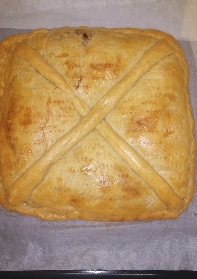 Una foto de Empanada de carrillada y salsa de queso