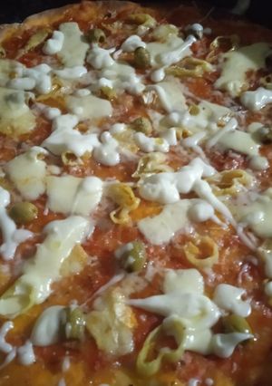 صورة لوصفة بيتزا خفيفة خشينة بززززاف بنينة 🍕🍕