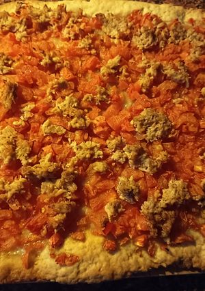 Una foto de Coca de Tomate