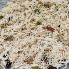 A picture of Steamed coconut rice Noodles with vegetables kurma.