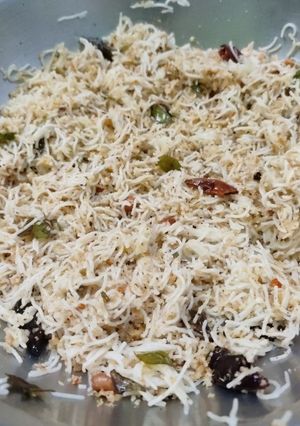 A picture of Steamed coconut rice Noodles with vegetables kurma.