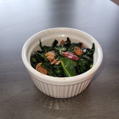 Sweet and sauteed broccoli leaves A picture of Sweet and sauteed broccoli leaves.