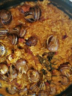 Una foto de Arroz con caracoles