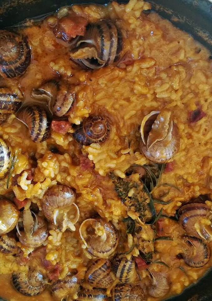 Una foto de Arroz con caracoles