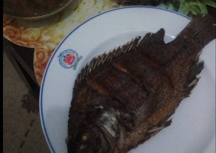 Recipe of Delicious Fried fish,sukuma and stew
