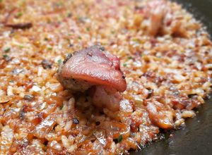 Una foto de Arroz de peus de porc y ceps