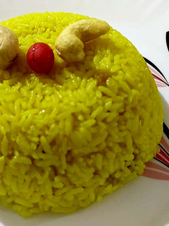 A picture of Pulao/ Basanti Pulao/ Sweet Yellow Rice.