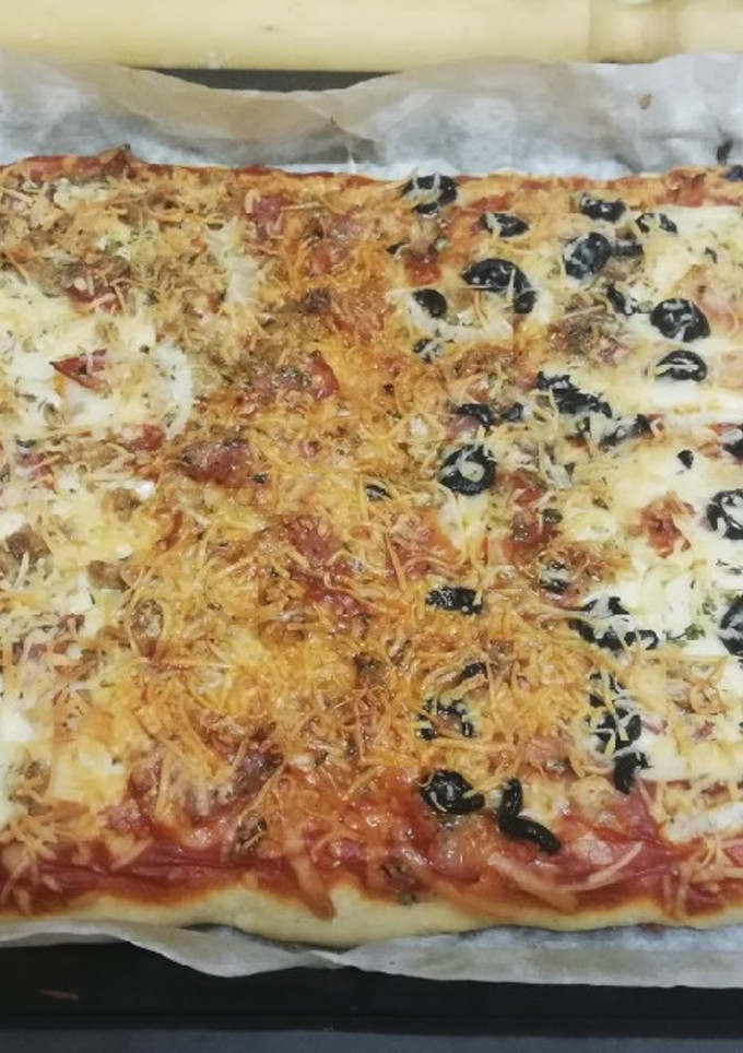 Una foto de Pizza familiar 2 en 1 🍕